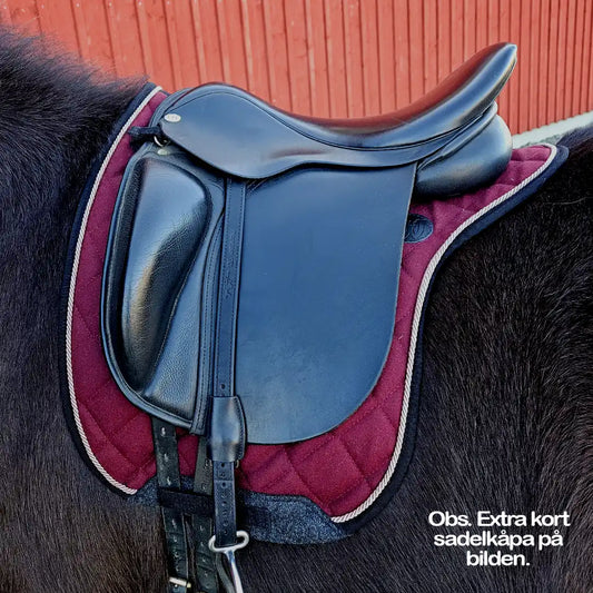 <tc>English saddle pad, 100% wool</tc>